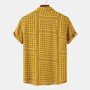 Back view of a yellow men's short-sleeved shirt featuring a geometric floral pattern print