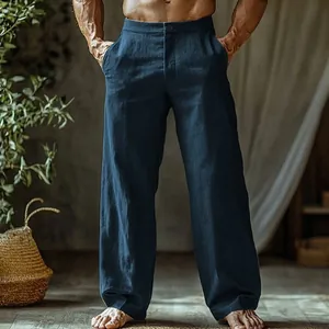 Detail view of men's breathable dark blue linen straight-leg summer beach pants