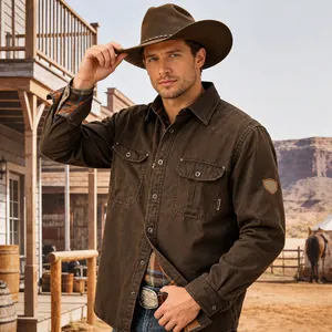 Detailed view of a vintage brown men's workwear jacket with multi-pocket design on model