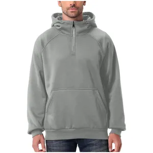 Close-up of a heavyweight men's grey half-zip hooded sweatshirt with front pocket