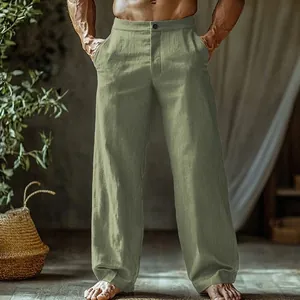 Detail view of men's breathable sage green linen straight-leg beach pants with pockets