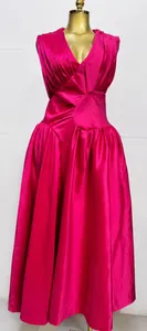 Elegant magenta pleated V-neck maxi dress with satin finish and gathered waist detail