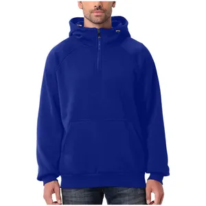 Close-up detail of men's royal blue heavy-weight half-zip hoodie featuring a front kangaroo pocket