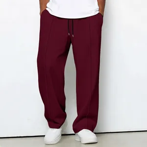 Classic men's burgundy waffle knit drawstring pants featuring a loose straight-leg fit design