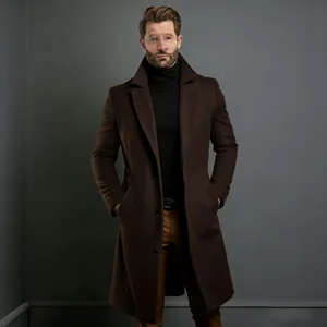 Elegant men's mid-length brown wool coat over black turtleneck in studio setting.