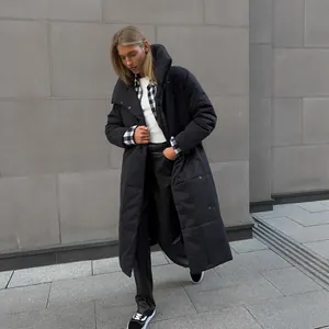 Stylish long black puffer coat for women with oversized collar and loose warm fit