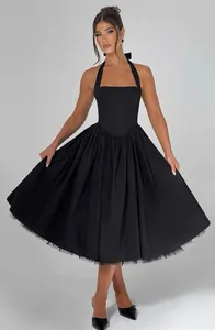 Elegant black halter neck pleated midi dress with a voluminous A-line skirt.