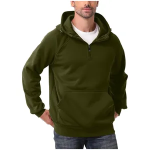 Close-up detail of olive green heavyweight men's half-zip hoodie with front kangaroo pocket