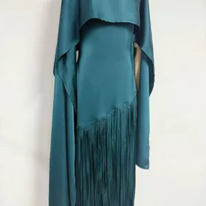 Elegant teal acetate satin maxi dress with long fringe detail and matching cape shrug