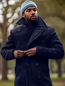 Detailed view of a stylish men's navy blue double-breasted wool pea coat for autumn and winter