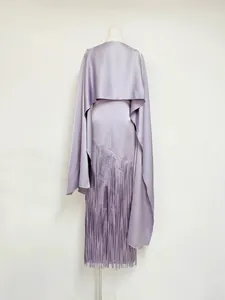 Back view of lavender satin maxi dress with matching bolero and fringe hem