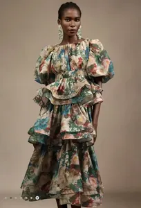 Detailed view of African-inspired tiered floral ruffle dress with puff sleeves