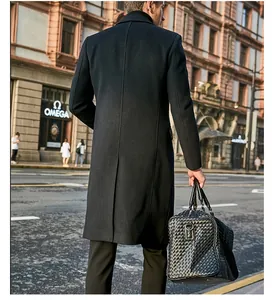 Back view of a classic black long wool coat for men with a stylish British design