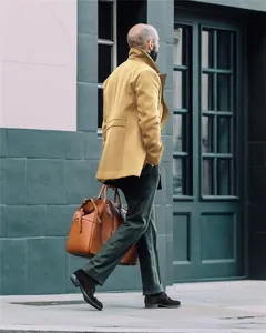 Classic mustard yellow wool coat for men featuring a stylish British mid-length design
