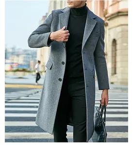 Classic men's long grey wool coat in British style for winter fashion street look.