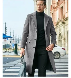 Sophisticated men's grey long wool coat in elegant British street style for winter