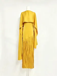 Elegant yellow satin-finish dress with long fringe and matching capelet.