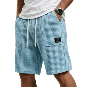 Lichtblaue Waffel-Struktur Herren-Freizeitshorts mit Kordelzug und schwarzem Aufnäher