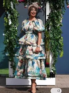 Elegant multi-layer floral tiered maxi dress featuring puffy bubble sleeves for party wear