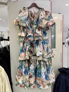 Floral print tiered ruffle maxi dress featuring elegant puff sleeves and layered design
