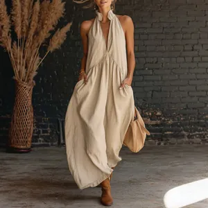Detail view of a breathable beige cotton-linen sleeveless maxi dress with deep V-neck