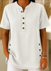 Women's white denim short sleeve t-shirt with button details and round neck for casual wear.