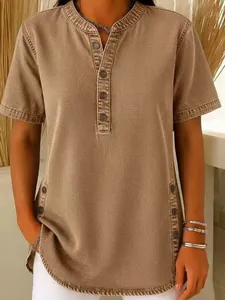 Women's casual tan denim short sleeve t-shirt with button neck and side split detail