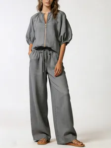 Casual grey two-piece set with puff sleeve zipper top and wide-leg drawstring pants