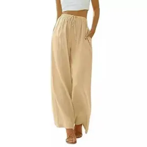 Full view of women's loose linen wide-leg pants with drawstring waist and pockets
