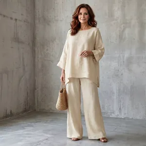 Detail view of a minimalist linen blend round neck tunic and wide leg trousers set