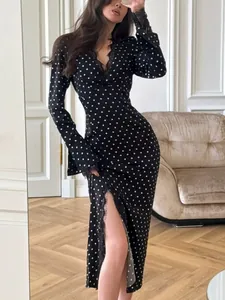 Elegant long sleeve black polka dot maxi dress with lace V-neck and high side slit detail