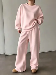 Completo due pezzi da donna rosa con felpa a girocollo e pantaloni larghi di qualità