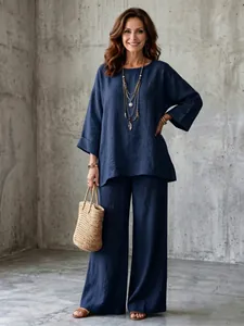 Full view of elegant navy blue linen-blend loose shirt and wide-leg pants outfit set