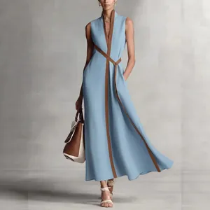 Elegant blue sleeveless V-neck maxi dress with brown contrast trim and waist tie detail.