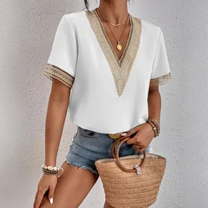 Elegant white V-neck short sleeve blouse featuring intricate gold lace trim details