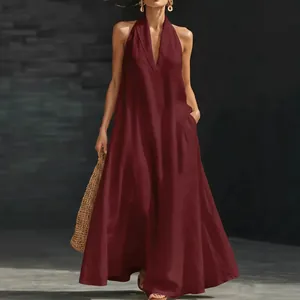 Detailed view of wine red V-neck halter maxi dress with breathable linen texture
