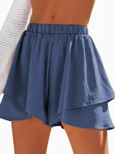 Vue détaillée du short-jupe à volants bleu marine pour femme avec taille élastique