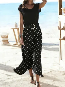 Elegant summer black and white polka dot mermaid maxi skirt for beach vacation and resort wear