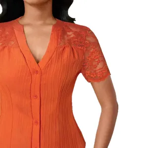 Stylish orange short sleeve button-up top with elegant lace hollow embroidery details