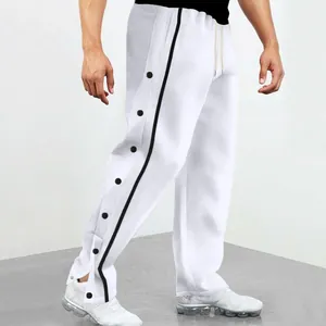 Pantalon de jogging blanc pour homme avec boutons-pression noirs et bandes latérales