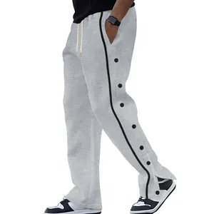 Pantalon de sport gris pour homme avec bande latérale noire et boutons-pression