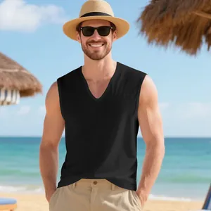Men's black V-neck muscle tank top styled with straw hat for beach vacation look