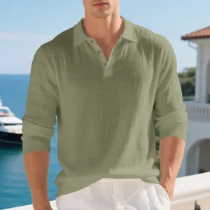 Close-up of men's olive green linen long sleeve polo shirt showing button collar texture.