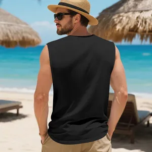 Detail view of men's black sleeveless quick-dry muscle tank top in a beach setting