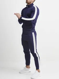 Tuta sportiva da uomo blu navy con strisce laterali bianche e design vestibilità slim