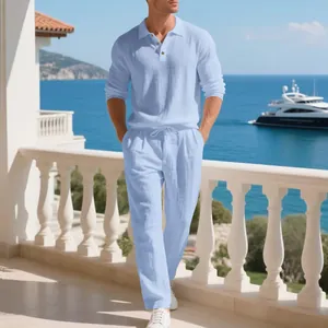 Detail view of men's breathable light blue linen long-sleeve set on a resort balcony