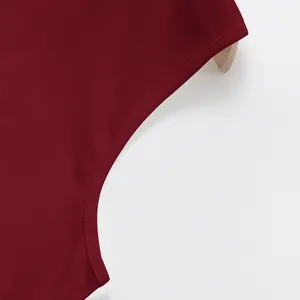 Close-up view of the high-quality double-stitching on a wine red sports tank top