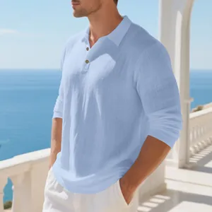 Close-up detail of light blue breathable linen-cotton long sleeve polo shirt for men.