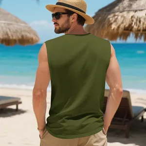 Back view of a premium olive green quick-dry sports tank top for men at a sunny beach.