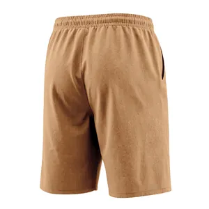 Rear view of men's casual brown linen shorts with elastic waist and loose fit design